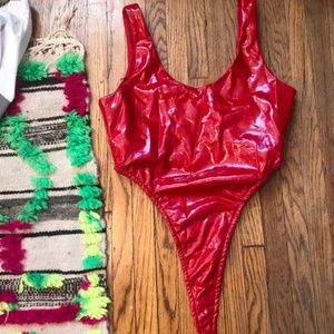 Red vinyl high cut bodysuit